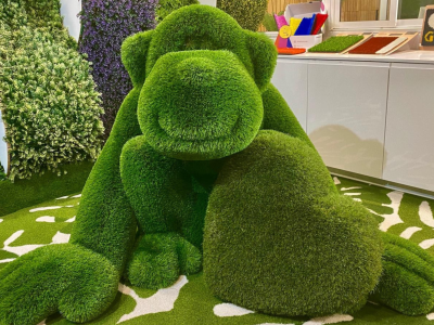 figura de césped artificial